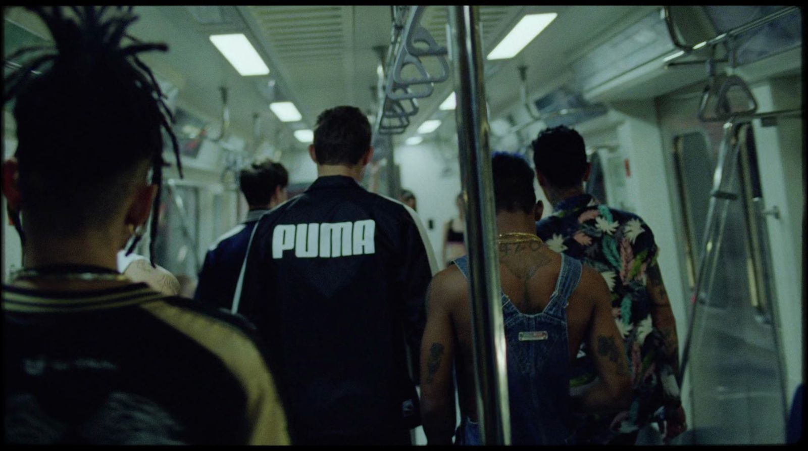 a group of people on a subway train