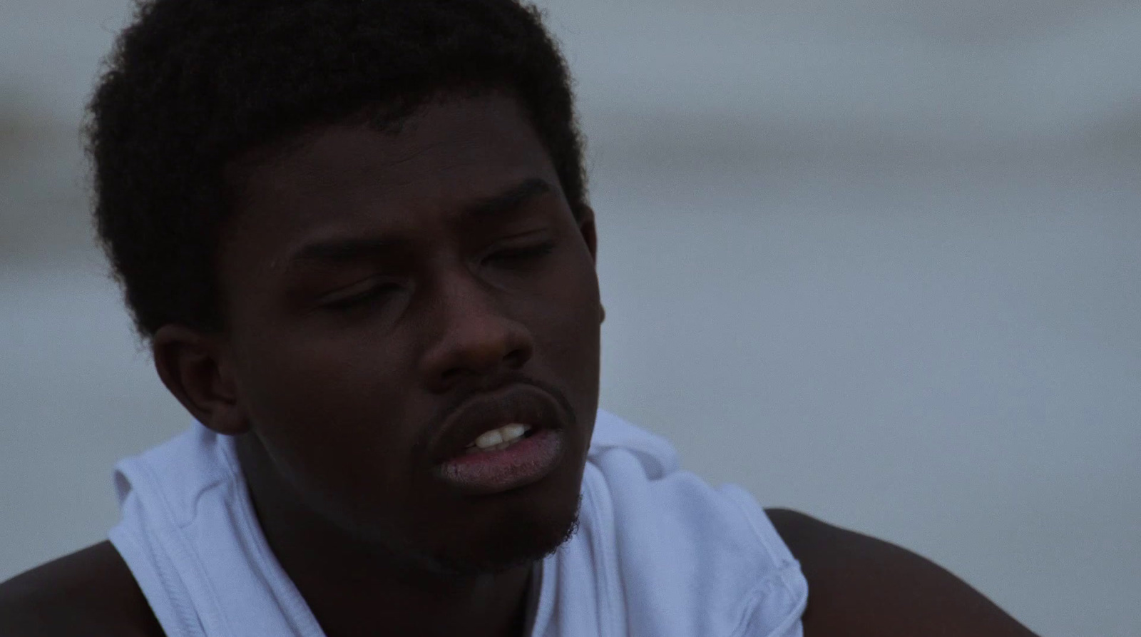 a close up of a person wearing a towel