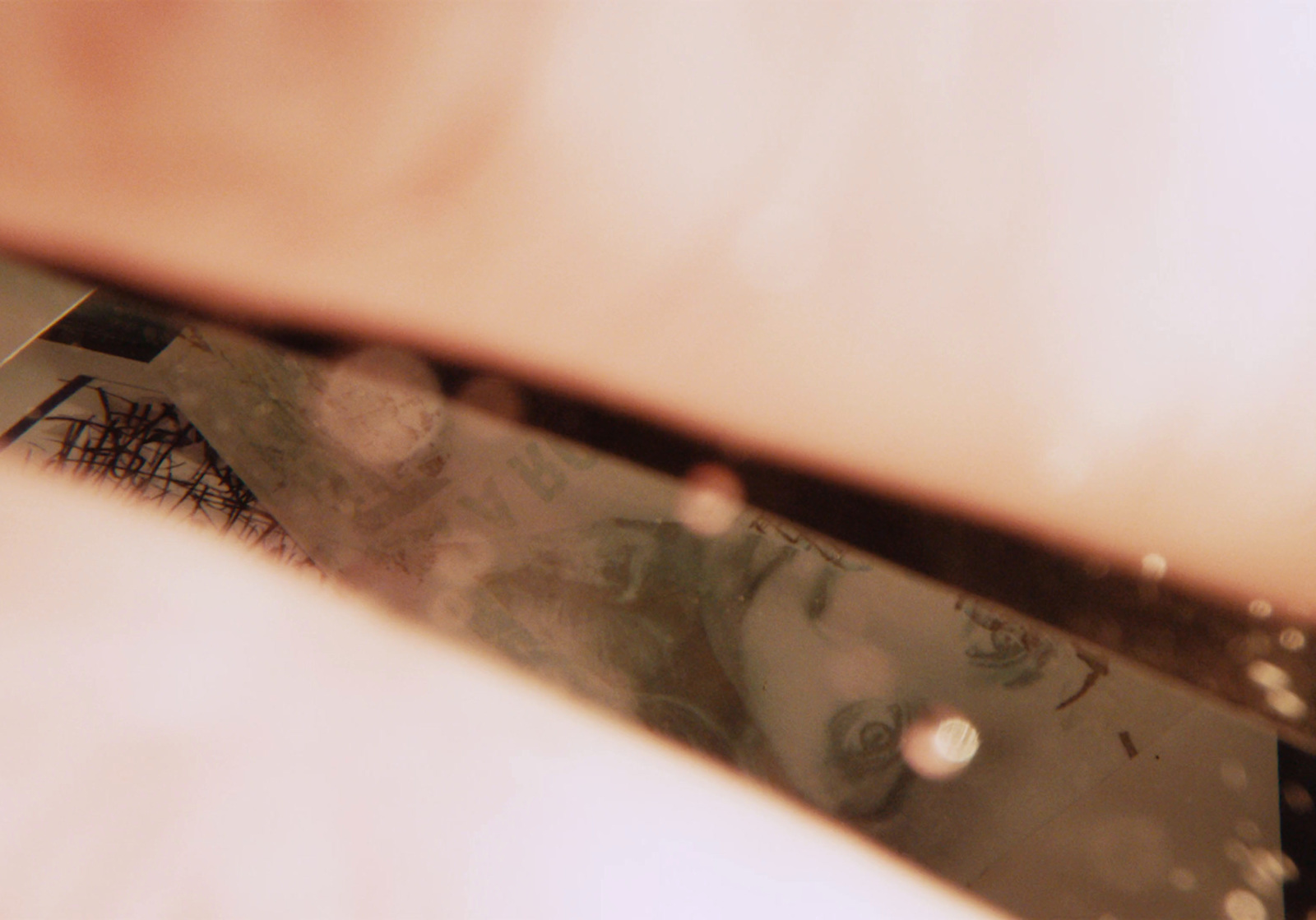 a close up of a knife with a blurry background