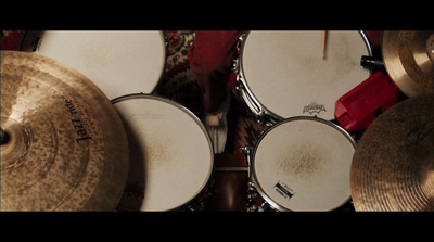 a group of drums sitting on top of a floor