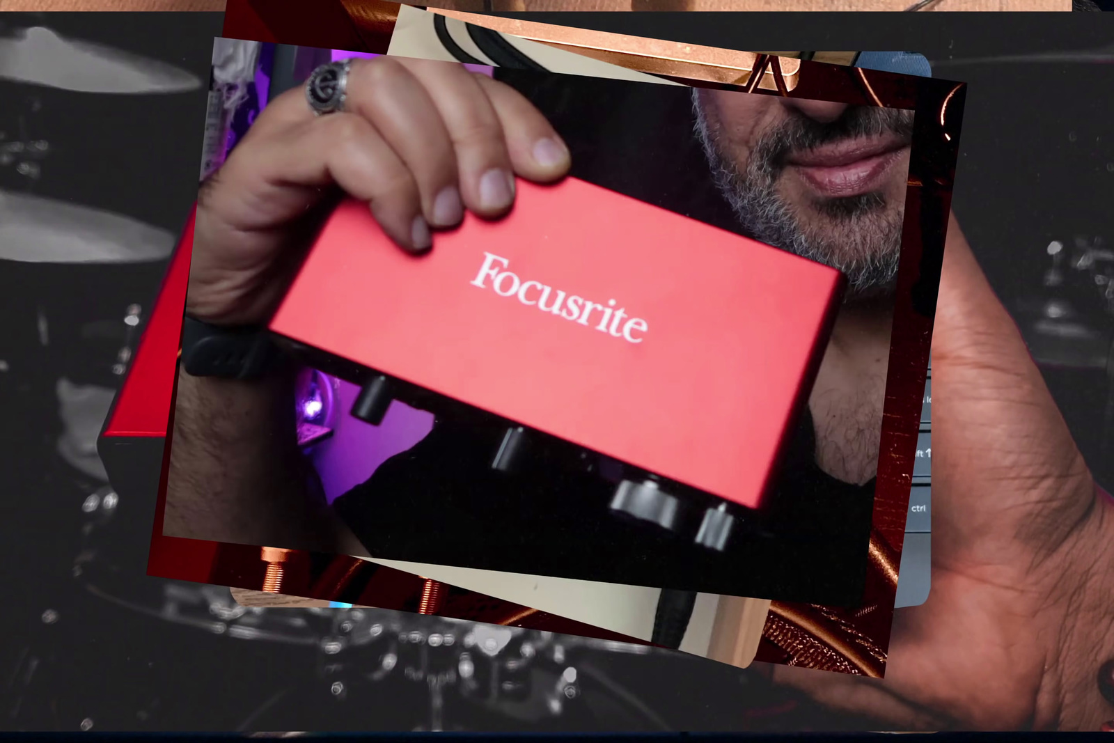 a man holding a red box in his hand