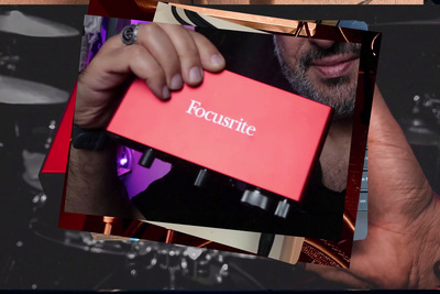 a man holding a red box in his hand