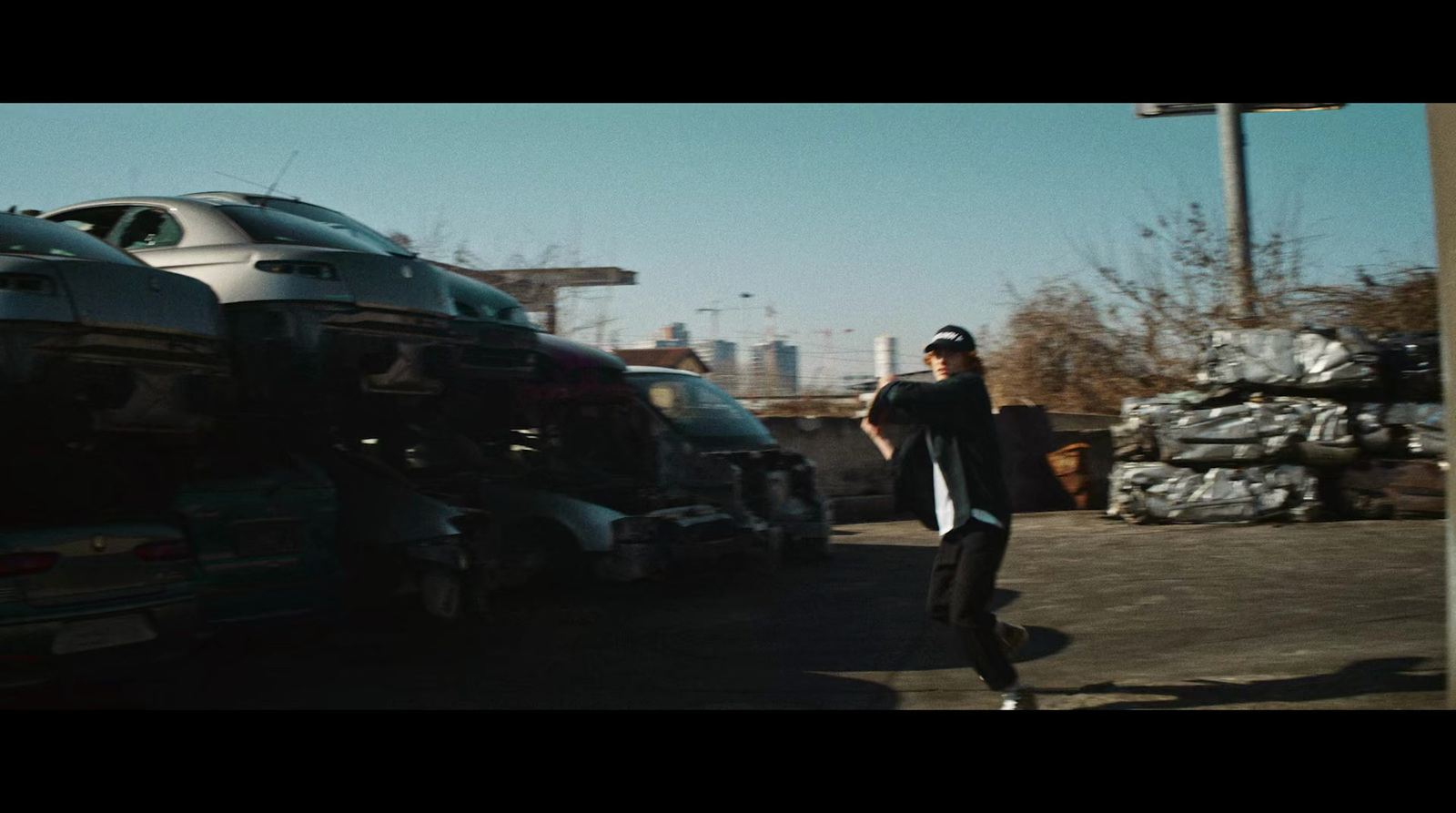 a man standing next to a large truck