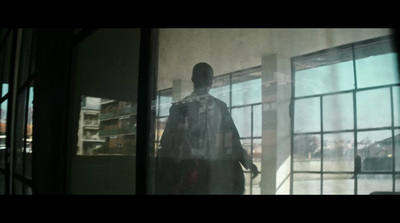 a man standing in front of a window