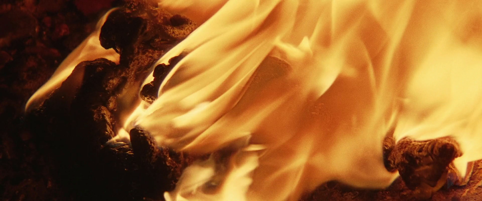 a close up of a fire in a fireplace