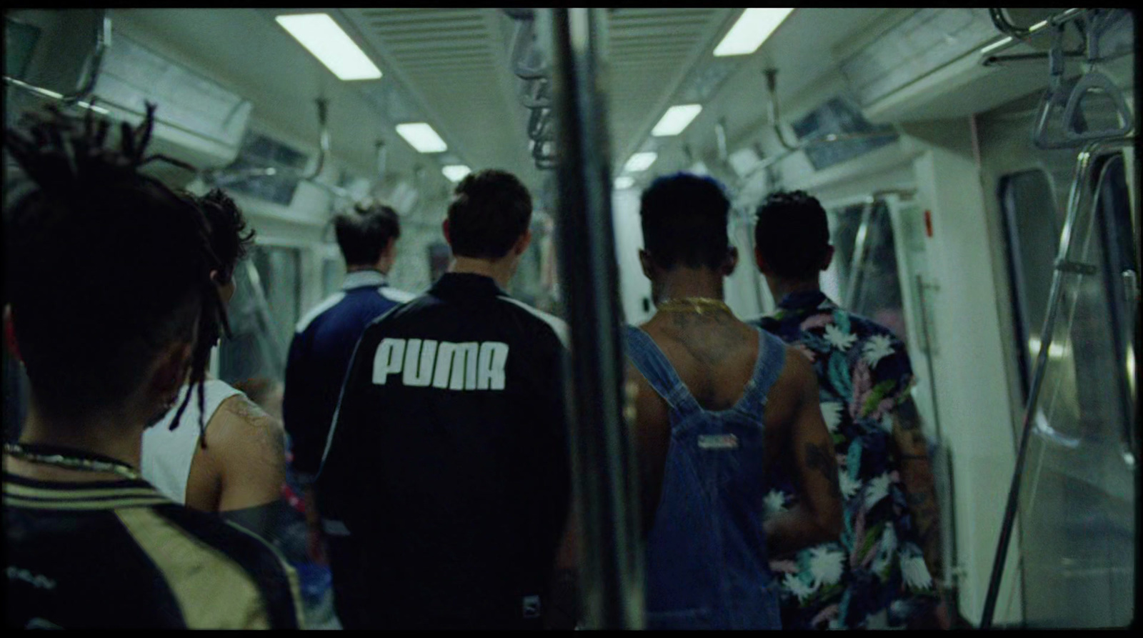 a group of people on a subway train