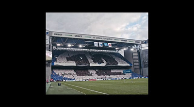 a stadium with a large number on the side of it