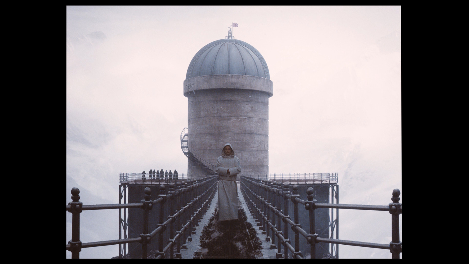 a tall tower with a dome on top of it