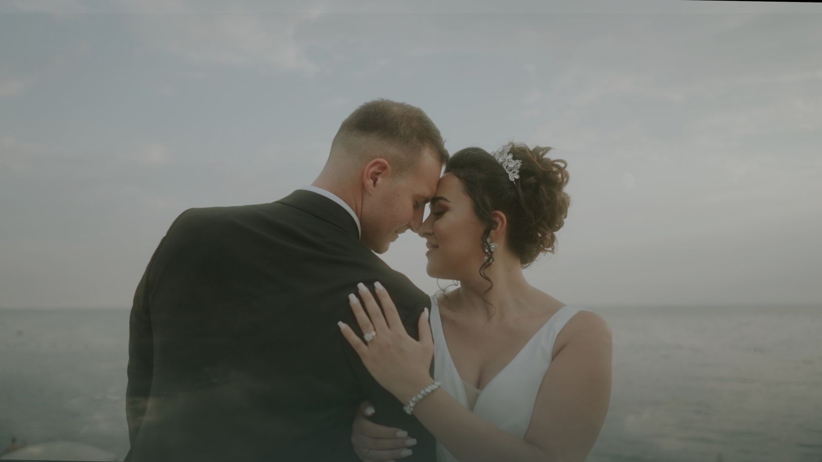 a man and a woman standing next to each other