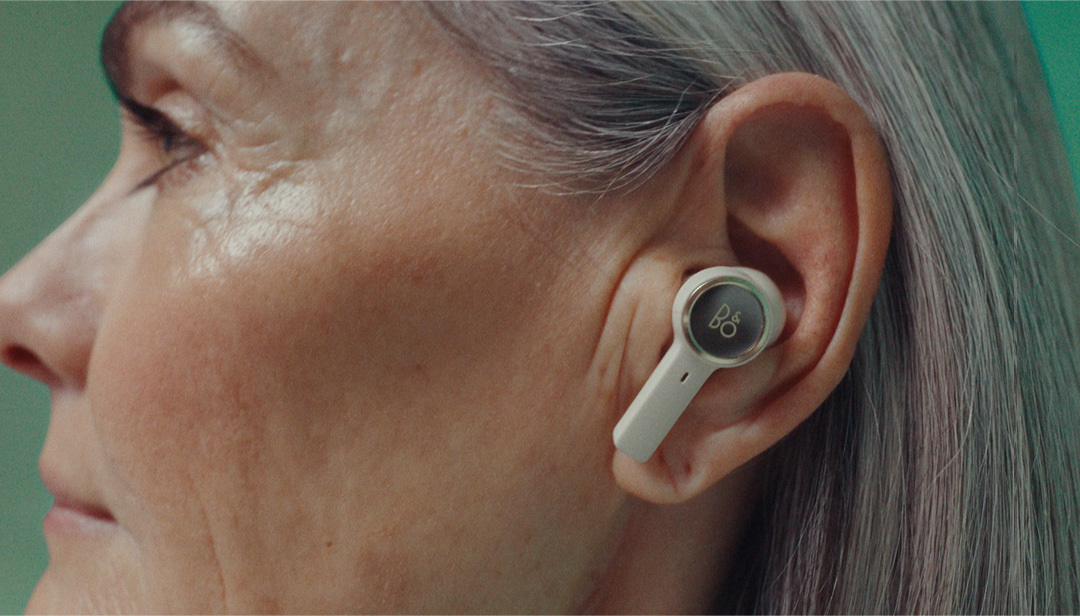 a woman with ear buds in her ears