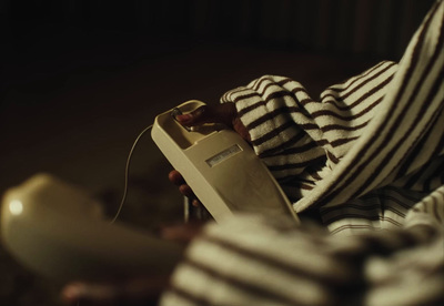 a person is holding a video game controller