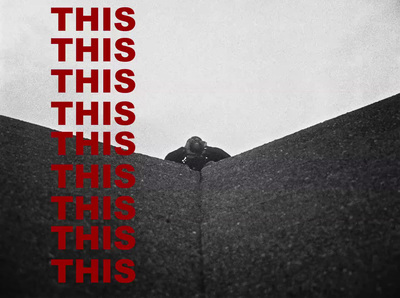 a black and white photo of a person on a roof