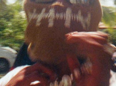 a close up of a person's face with fake teeth