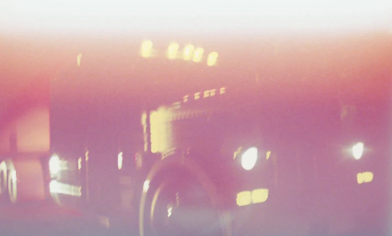 a blurry photo of a camera with lights on