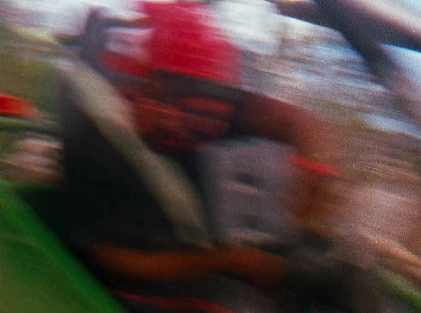 a blurry photo of a person on a surfboard