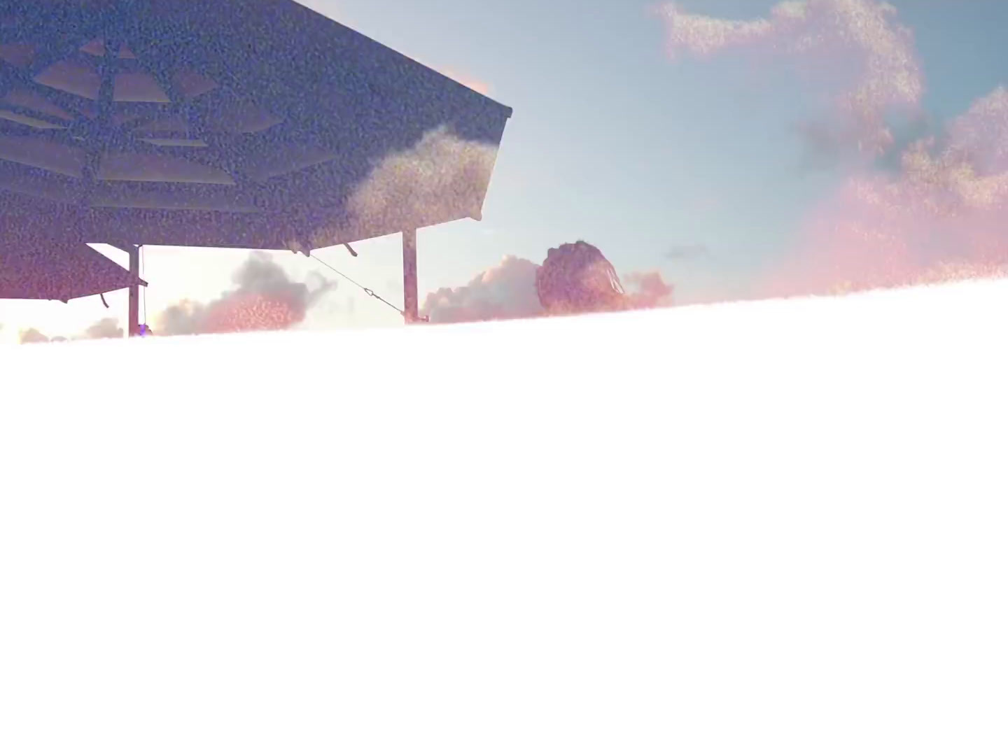 a man riding a snowboard down a snow covered slope