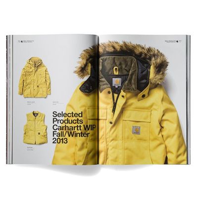 a magazine with a yellow jacket and a yellow jacket