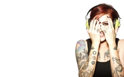 a woman with headphones covering her eyes