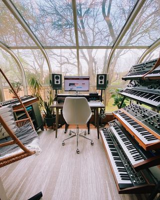 a room filled with lots of musical equipment