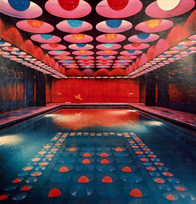 a swimming pool with a lot of circles on the ceiling