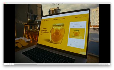 a computer screen with a jar of honey on it