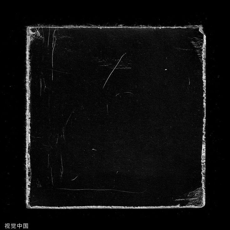 a black and white photo of a square