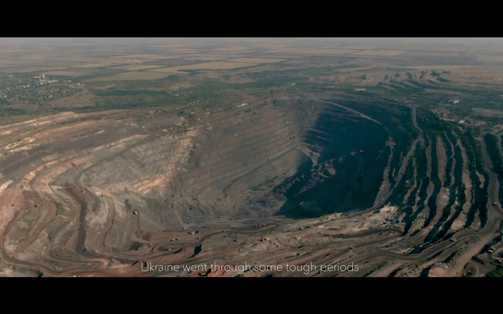 an aerial view of a large open pit