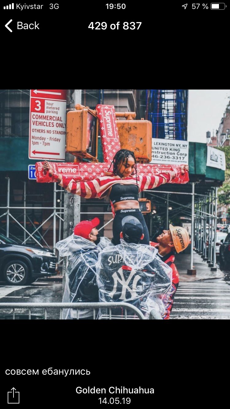 a picture of a person on a motorcycle in the rain