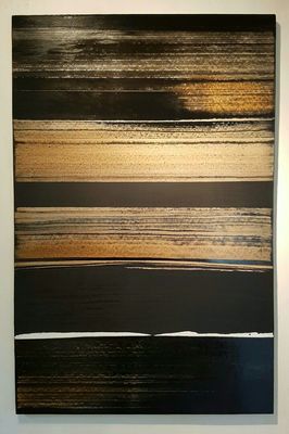 a painting of black, brown, yellow and white stripes