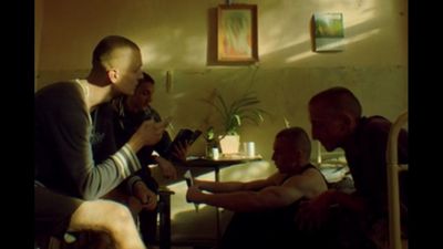 a group of men sitting around a table