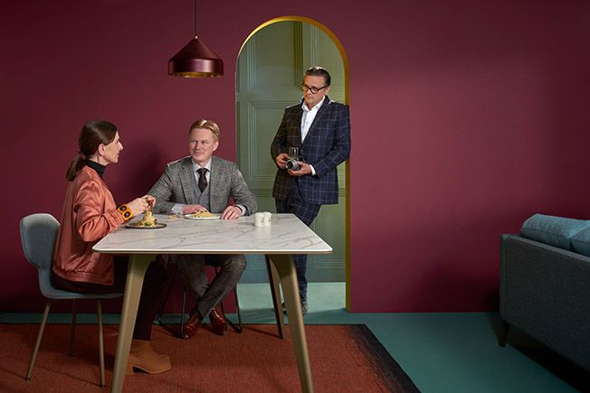 a group of people sitting around a table