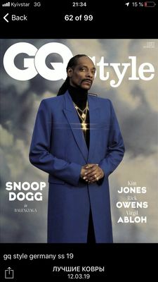 a man in a blue suit on the cover of a magazine