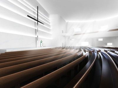 a church with wooden pews and a cross