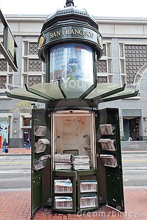 a public phone booth on a city street