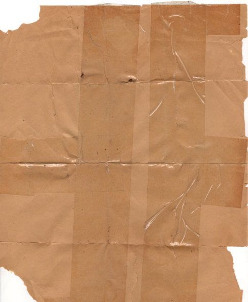 a piece of brown paper that has been torn off