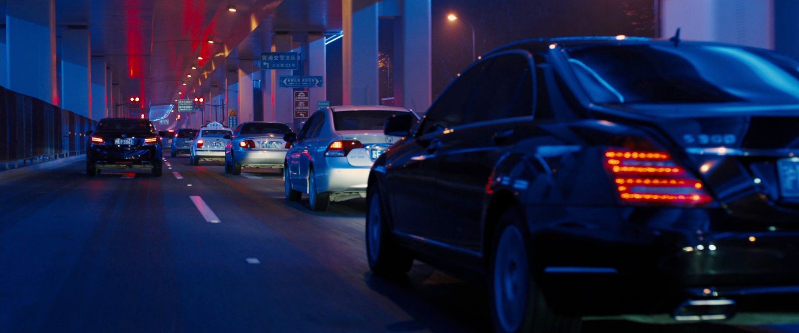 a bunch of cars that are sitting in the street