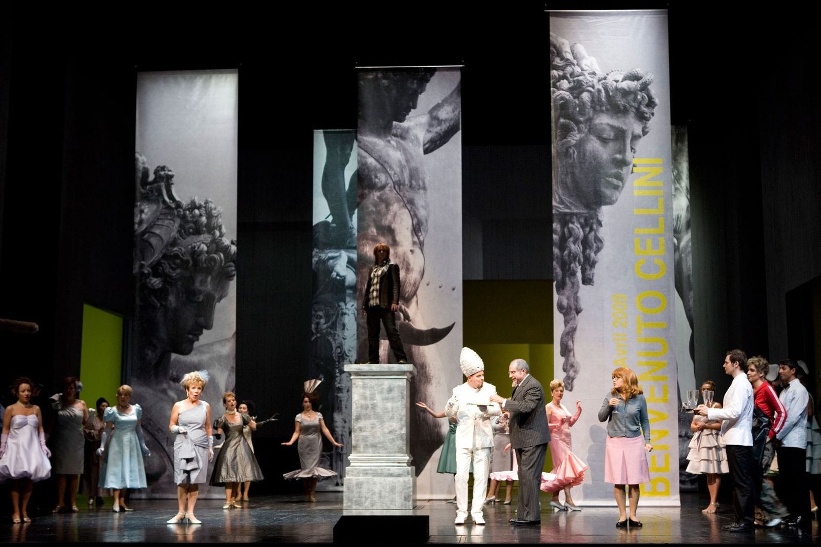 a group of people standing on top of a stage