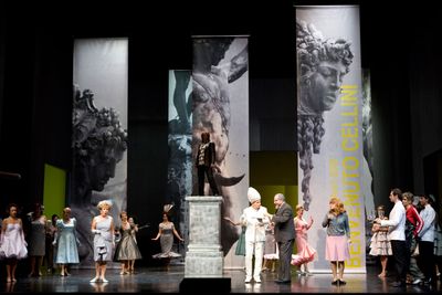 a group of people standing on top of a stage