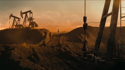 a group of oil pumps sitting on top of a hill