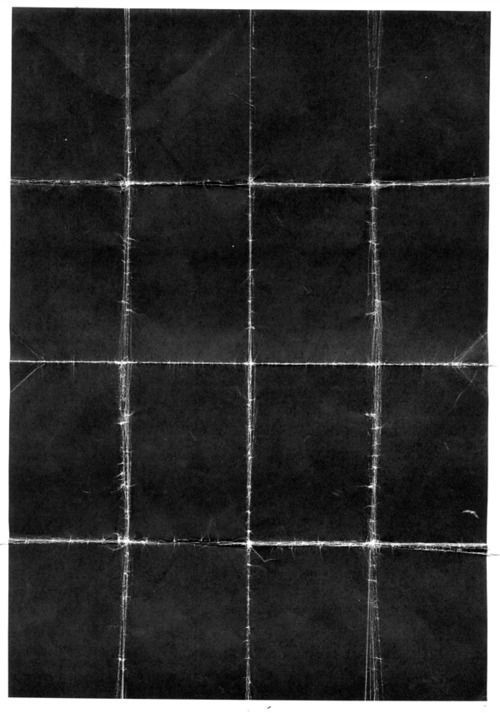 a black and white photo of a grid pattern