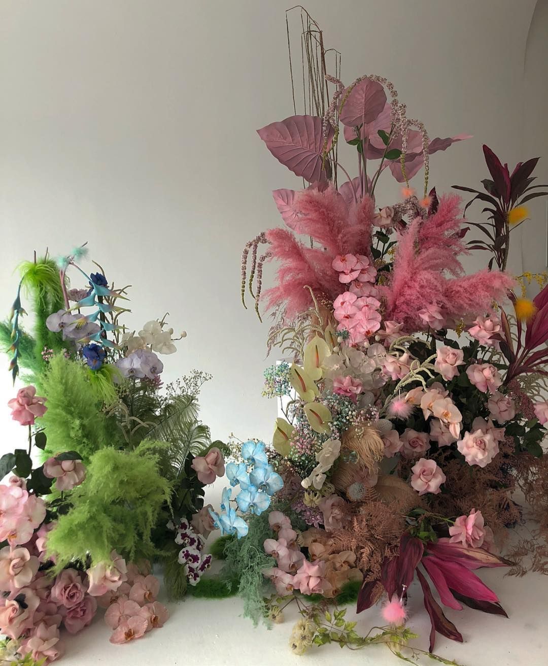 a bunch of flowers that are sitting on a table