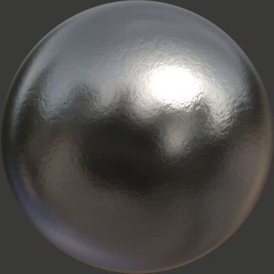 a shiny metal object is shown on a black background