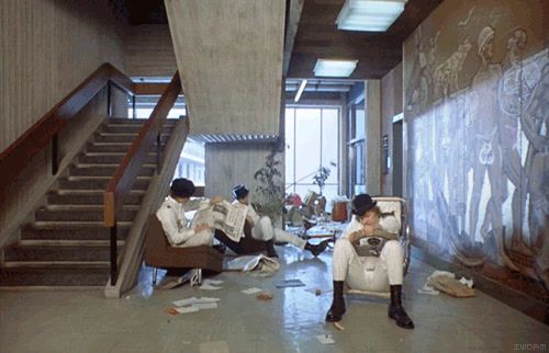 a group of people sitting in chairs in a room