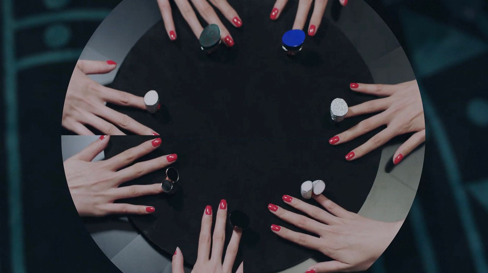 a group of women with manies on their hands around a table