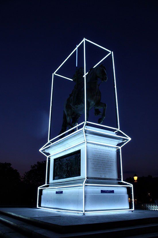 a statue of a horse in a glass box