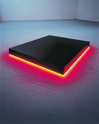 a black table with a red light on it