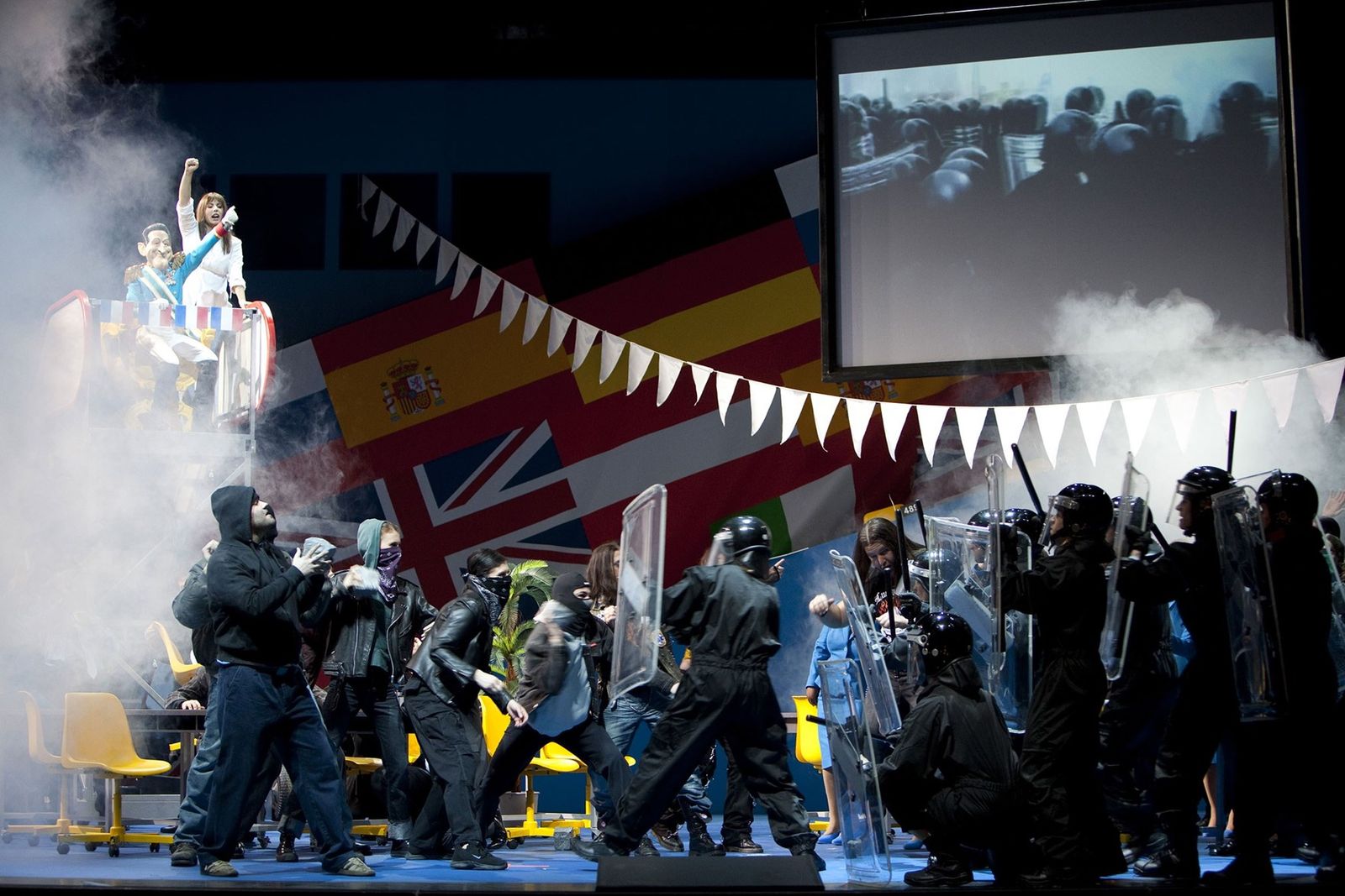 a group of people standing on top of a stage