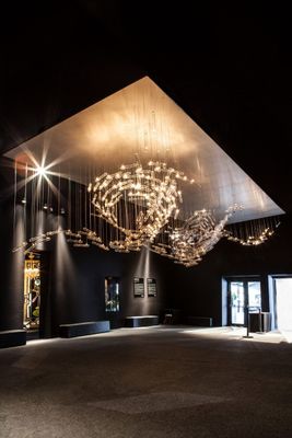 a large chandelier hanging from the ceiling of a building