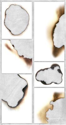 a series of four photos of a piece of paper