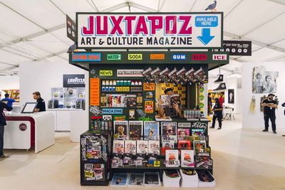 a group of people standing around a store